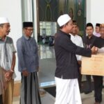Dirpamobvit Polda Aceh Bagikan Bansos kepada Masyarakat Kurang Mampu