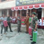 Babinsa Jajaran Kodim 0107/Asel Dampingi Pemberian Uji Coba Makanan Bergizi Gratis Dalam Program Pemerintah