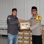 Kapolres Aceh Timur Serahkan 260 Bingkisan Lebaran Kepada Wartawan
