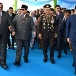 Kapolri dan Presiden Kenakan Tanda Kehormatan Bintang Bhayangkara Utama Saat Pimpin Upacara HUT Bhayangkara ke-79