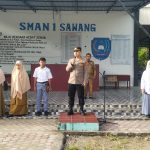 Menjadi Pembina Upacara, Kapolsek Sawang Sampaikan Pesan Kamtibmas di SMA 1 Sawang