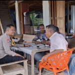 Ngopi Santai, Bhabinkamtibmas Polsek Sawang Sambangi Masyarakat Dengarkan Aspirasi Warga