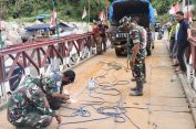 TNI – Dinas PU dan Warga percepat Perbaikan Jembatan Bailey Umah Besi Bener Meriah